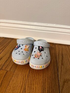 CROCS Kids Pale Blue Clogs with Colorful Bead Trim and Character Jibbitz